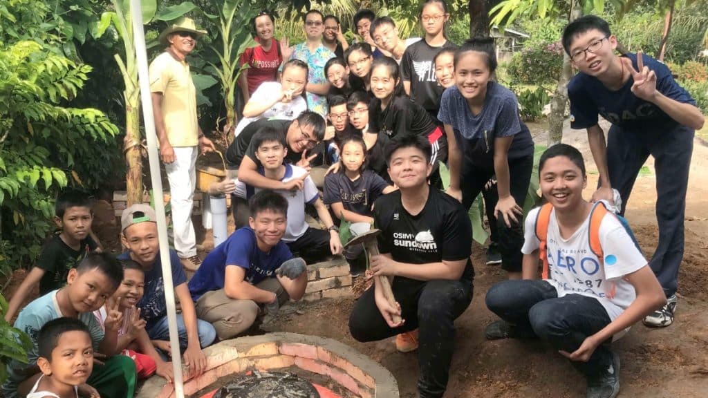 As part of their educational activities, the students successfully built a safe water garden for a local village family.